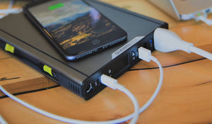 Goal Zero Sherpa AC power bank charging a smartphone