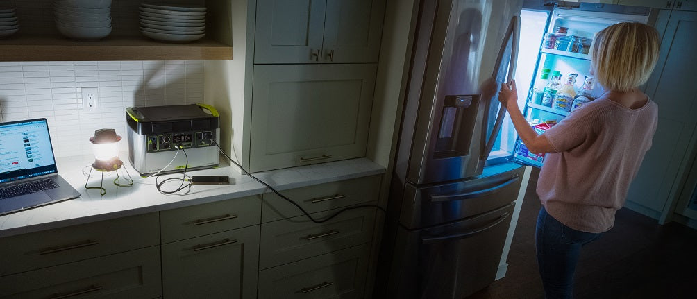 Goal Zero Yeti power stations powering laptop, lantern and fridge at home