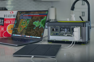Goal Zero Yeti power stations powering laptop and tablet