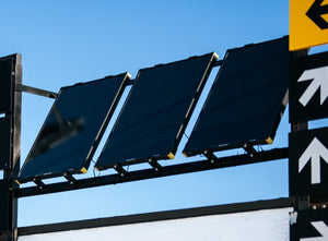 Goal Zero boulder solar panels mounted on traffic light